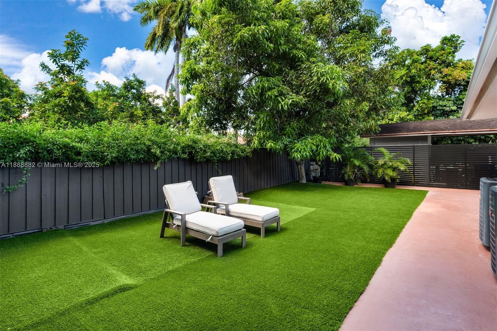 420 Southwest 19th Road Miami, FL 33129 - Photo 25 of 32 a view of a chair and table in the garden