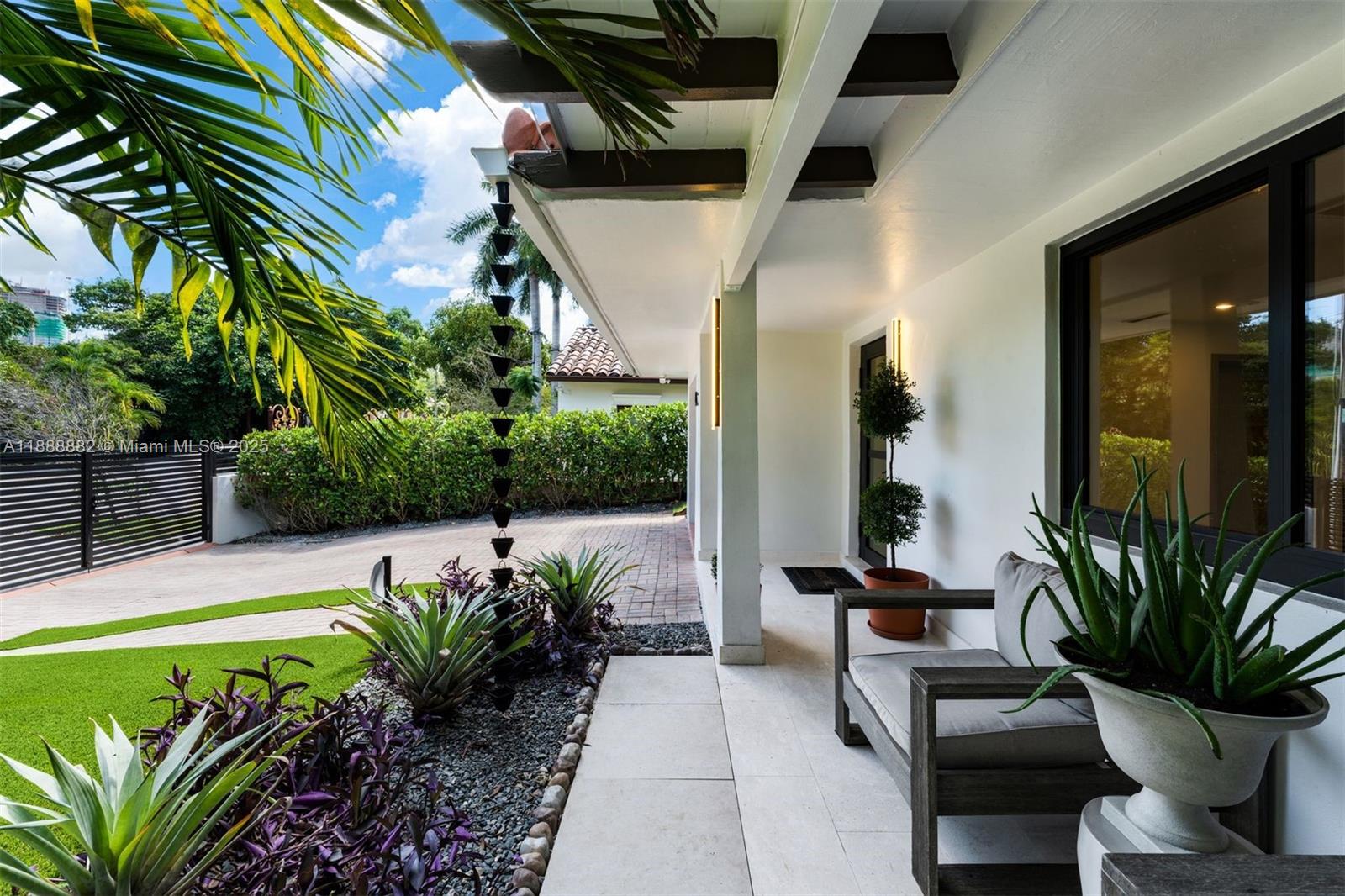 420 Southwest 19th Road Miami, FL 33129 - Photo 29 of 32 a view of a chairs and table in the patio