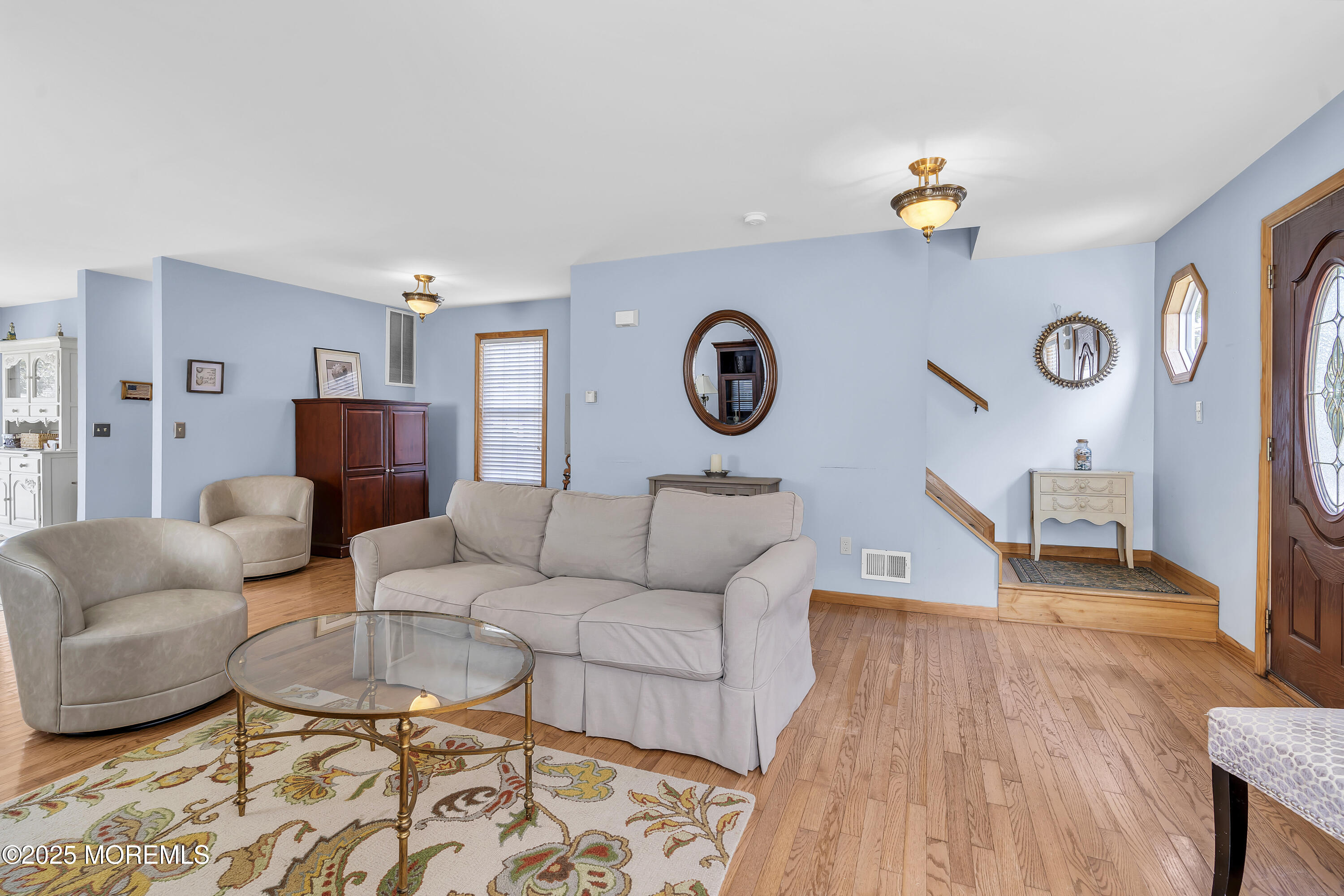 143 Lake Avenue Manasquan, NJ 08736 - Photo 14 of 18 a living room with furniture and a wooden floor