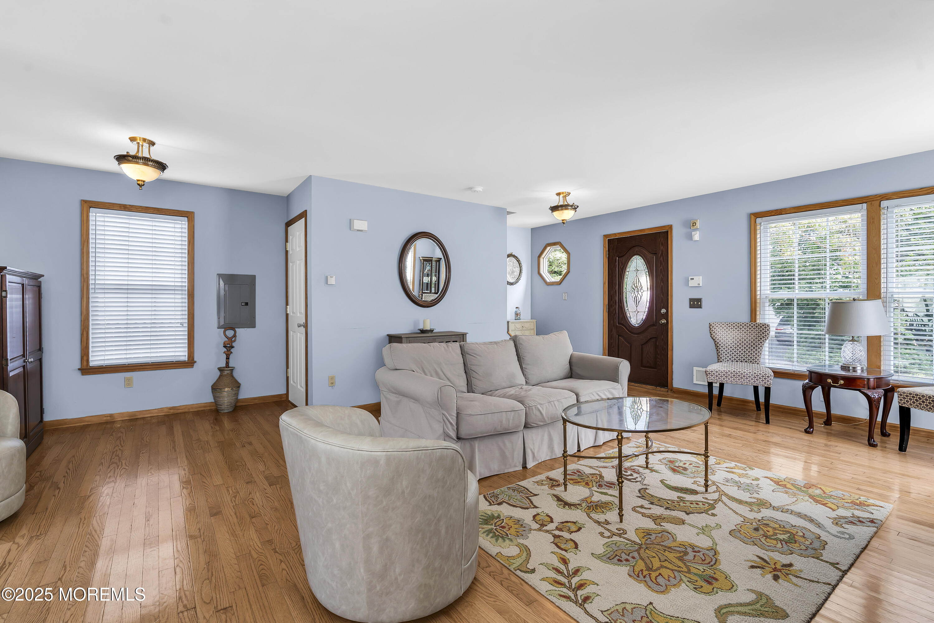 143 Lake Avenue Manasquan, NJ 08736 - Photo 2 of 18 a living room with furniture and a window