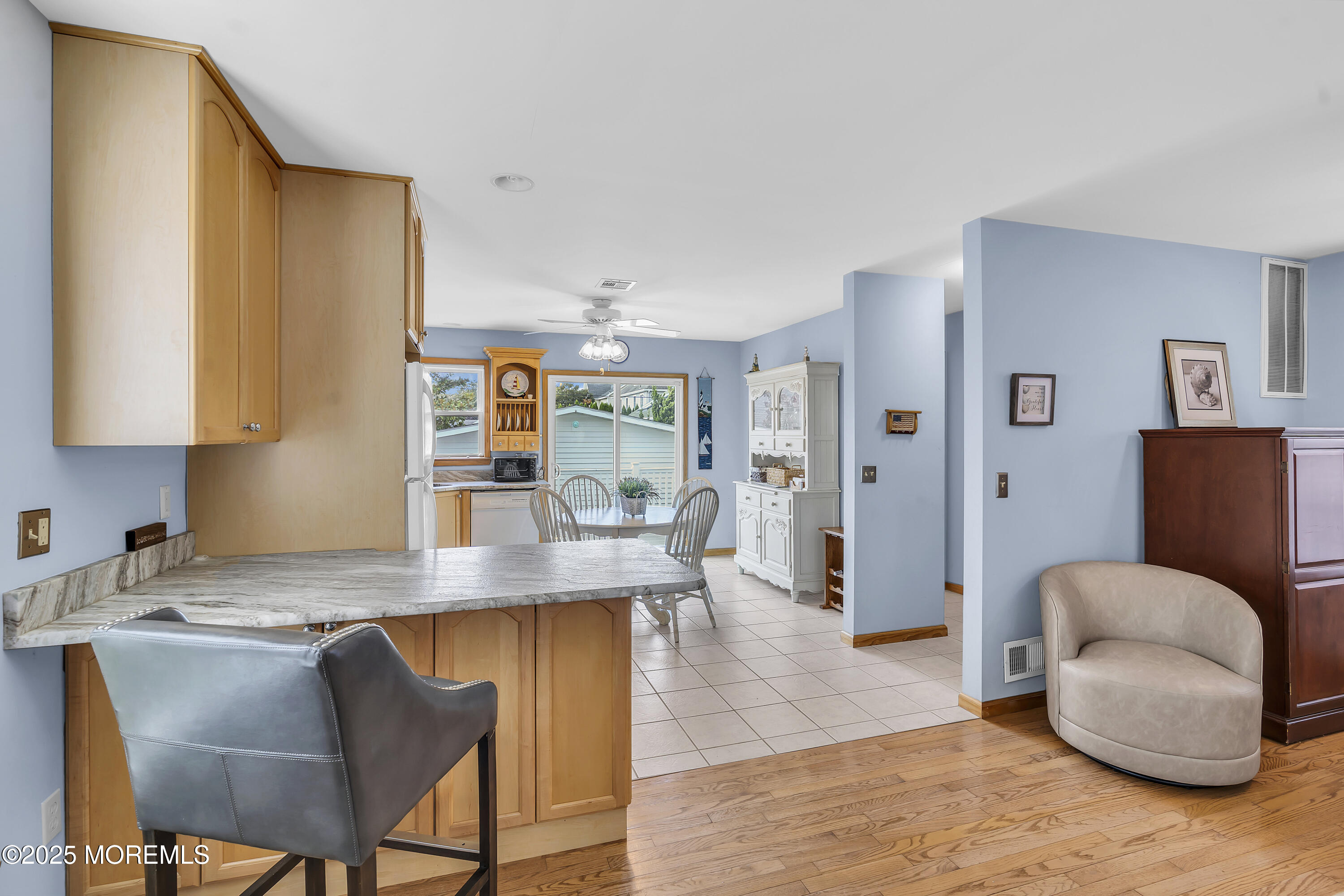 143 Lake Avenue Manasquan, NJ 08736 - Photo 5 of 18 a view of kitchen with cabinets and wooden floor