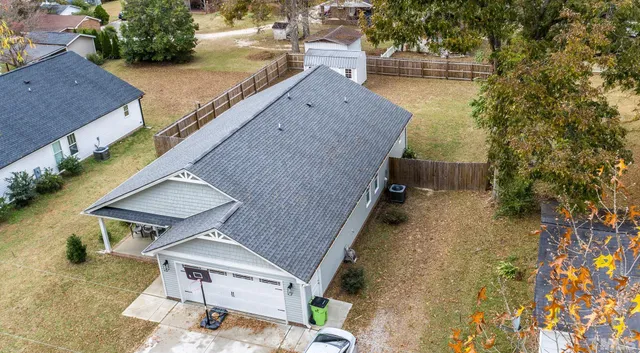 a house view with a backyard space