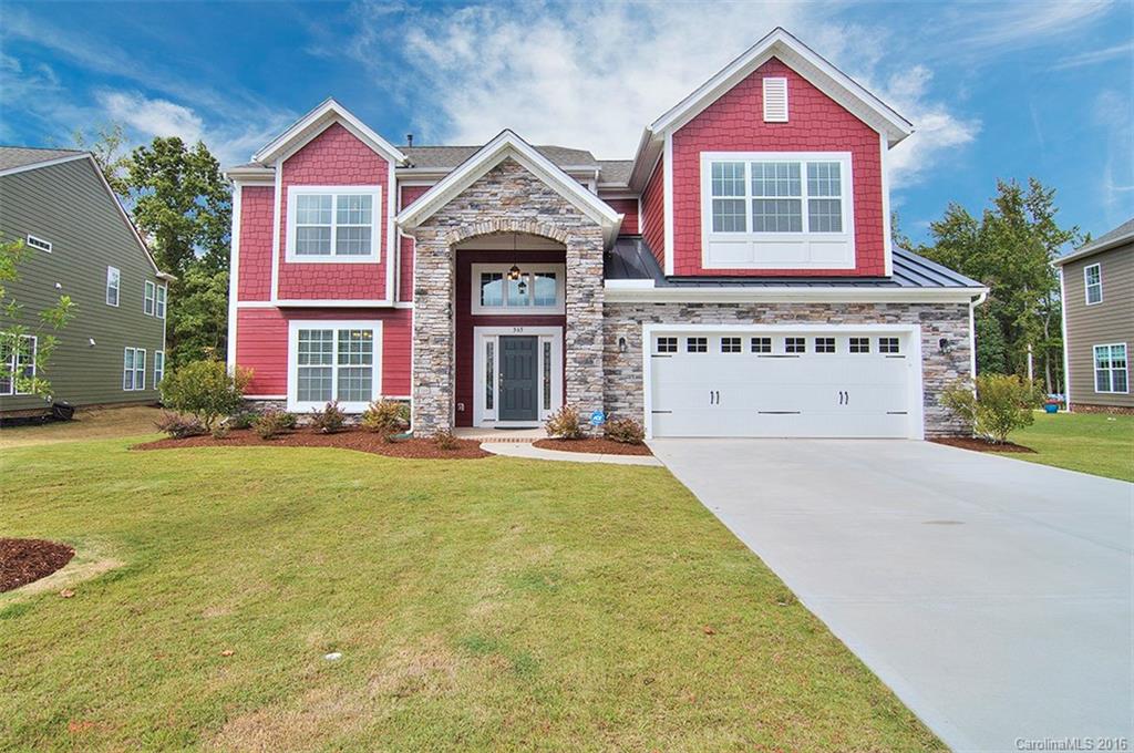 565 Brookhaven Drive Fort Mill, SC 29708 - Photo 1 of 24 a front view of a house with yard