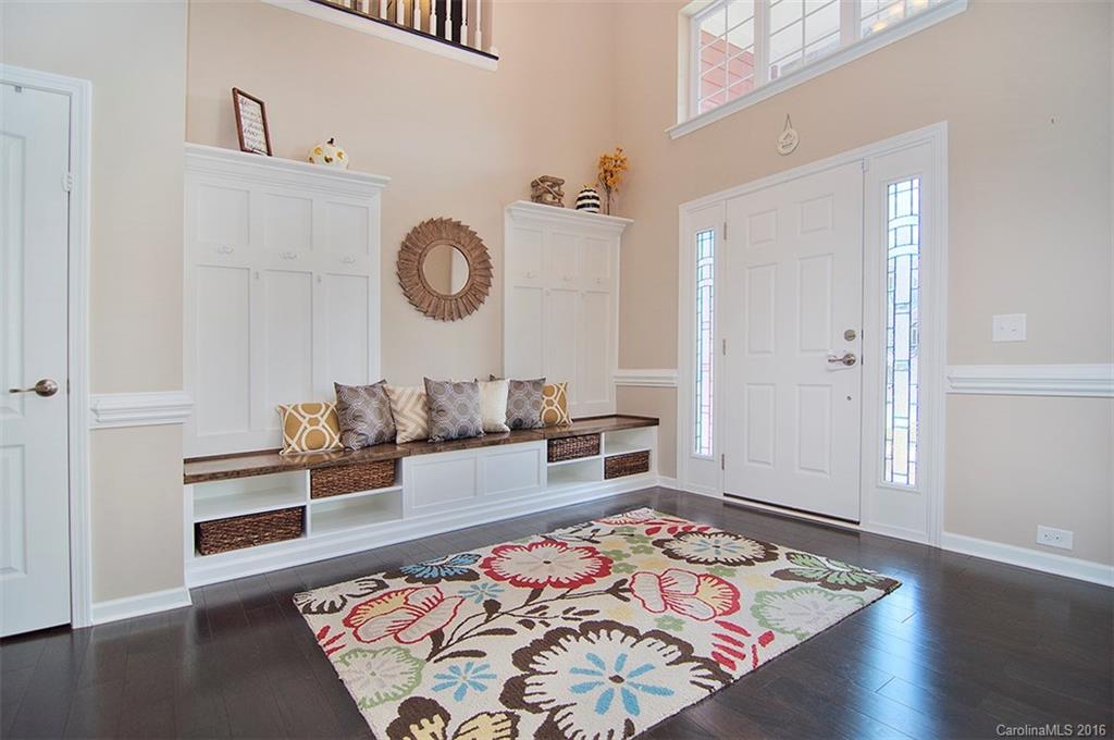 565 Brookhaven Drive Fort Mill, SC 29708 - Photo 2 of 24 a living room with a couch and wooden floor