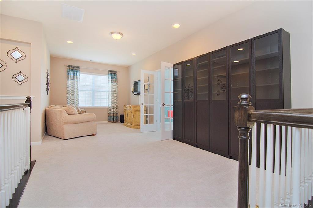 565 Brookhaven Drive Fort Mill, SC 29708 - Photo 12 of 24 a bedroom with a bed and window