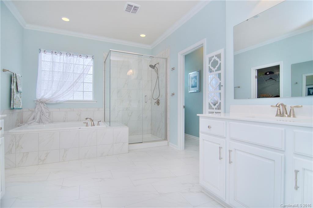 565 Brookhaven Drive Fort Mill, SC 29708 - Photo 16 of 24 a bathroom with a bathtub shower and a sink