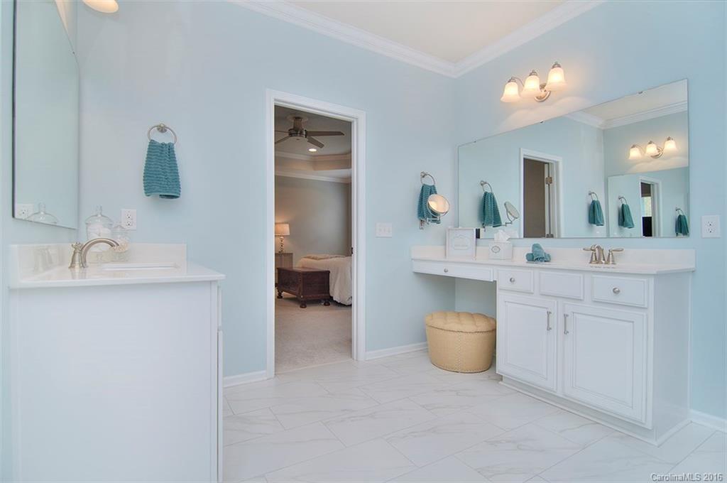 565 Brookhaven Drive Fort Mill, SC 29708 - Photo 17 of 24 a bathroom with a sink double vanity and a toilet