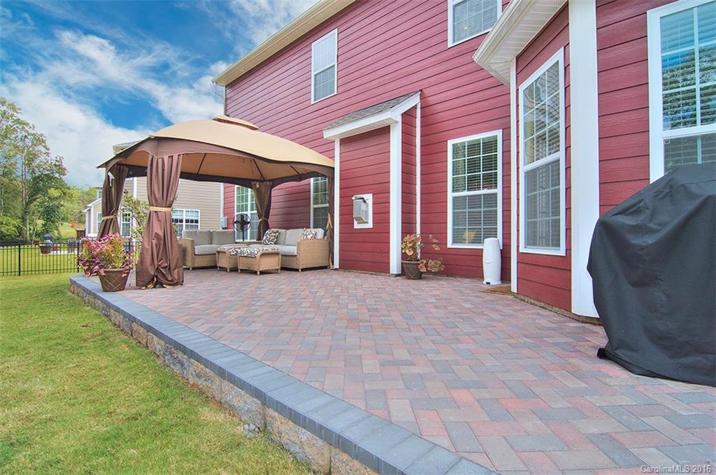 565 Brookhaven Drive Fort Mill, SC 29708 - Photo 21 of 24 a view of a house with backyard porch and furniture