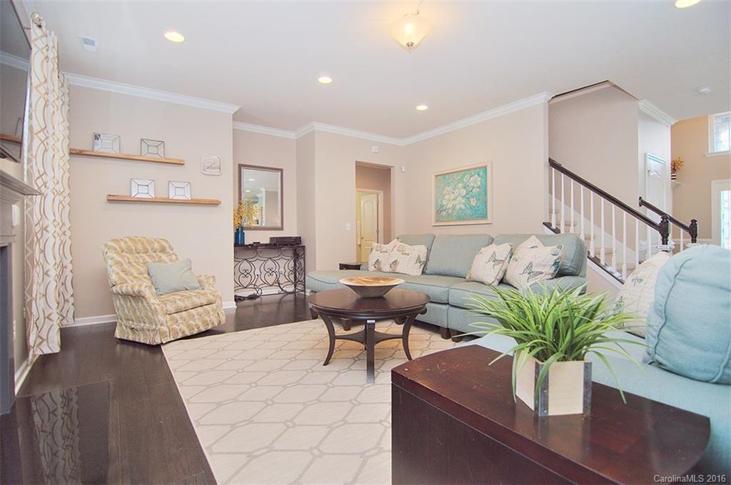 565 Brookhaven Drive Fort Mill, SC 29708 - Photo 9 of 24 a living room with furniture potted plant and a table