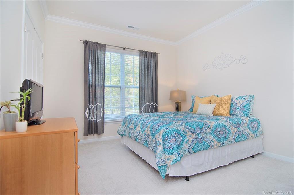 565 Brookhaven Drive Fort Mill, SC 29708 - Photo 10 of 24 a bedroom with bed and window