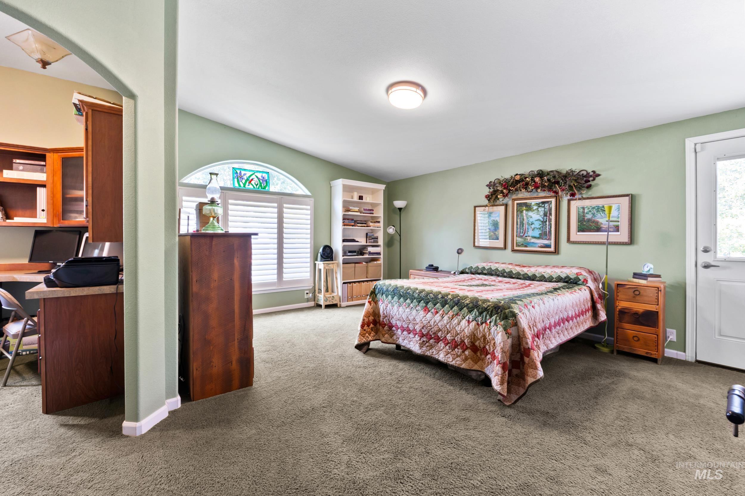 28279 Pearl Road Parma, ID 83660 - Photo 48 of 48 Bedroom with an office area, carpet, and arched walkways