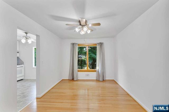 516 Knickerbocker Road Cresskill, NJ 07626 - Photo 9 of 31 a view of an empty room with a window