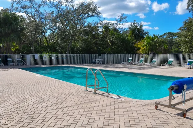 a view of a chairs and tables in the patio