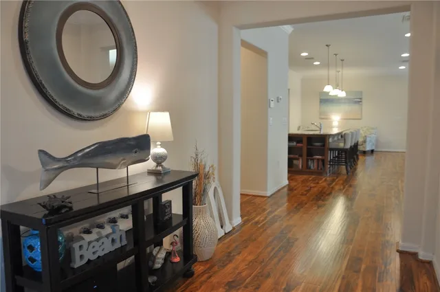 a view of a livingroom with furniture and wooden floor