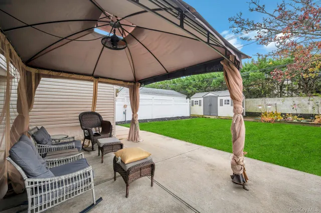 a garden view with a seating space