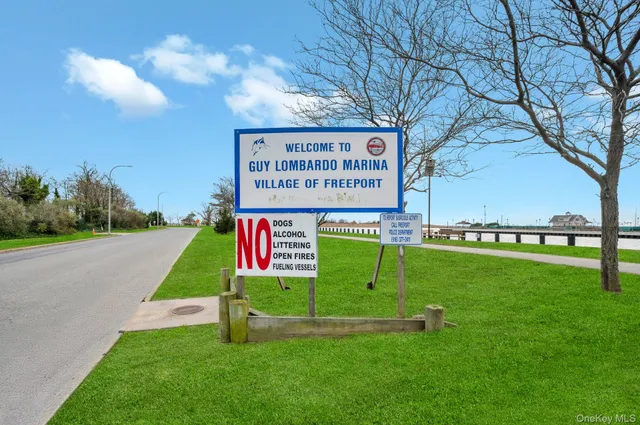 a view of a park with welcome board