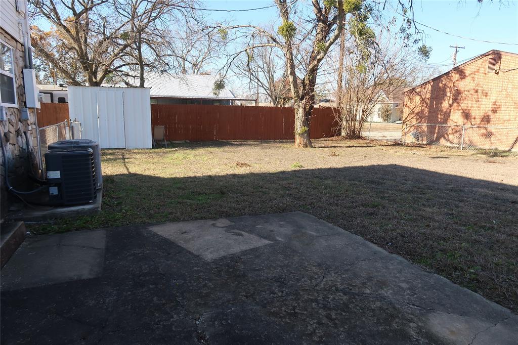 406 North Denny Street, Unit B Howe, TX 75459 - Photo 11 of 12 a view of yard covered with snow