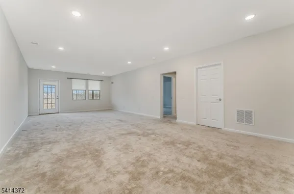 an empty room with an entryway