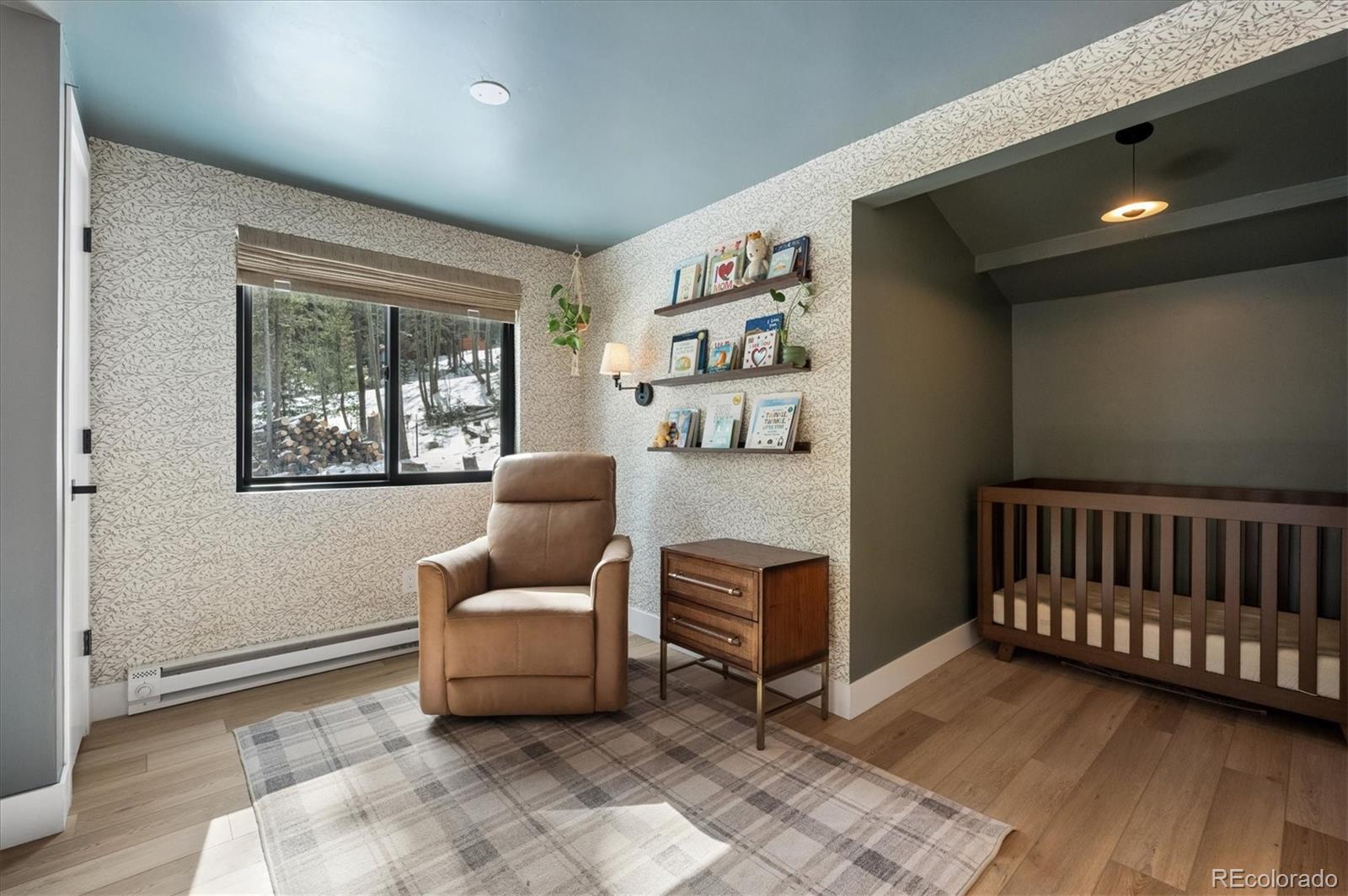 1633 Sinton Road Evergreen, CO 80439 - Photo 34 of 50 a living room with furniture and a window