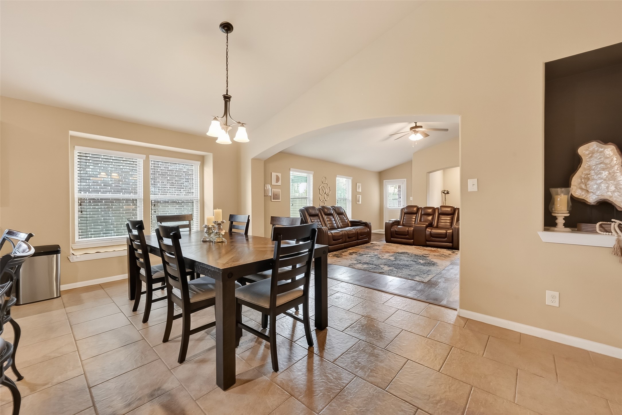 5919 Micah Lane Rosenberg, TX 77471 - Photo 14 of 32 Dining area with an open layout that flows into the living space, creating a comfortable and connected setting for everyday living