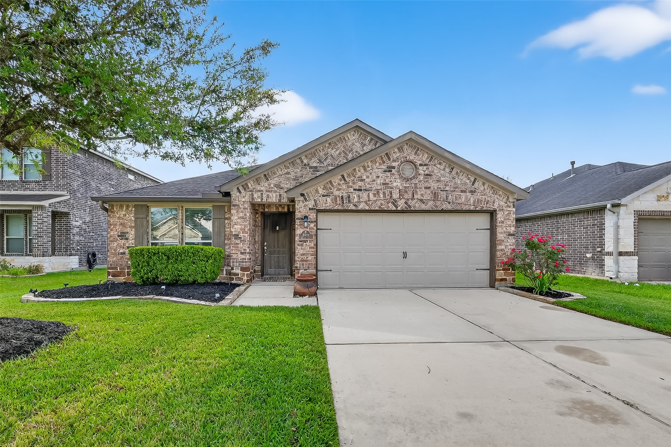 5919 Micah Lane Rosenberg, TX 77471 - Photo 2 of 32 Beautifully landscaped front facade, making a great first impression