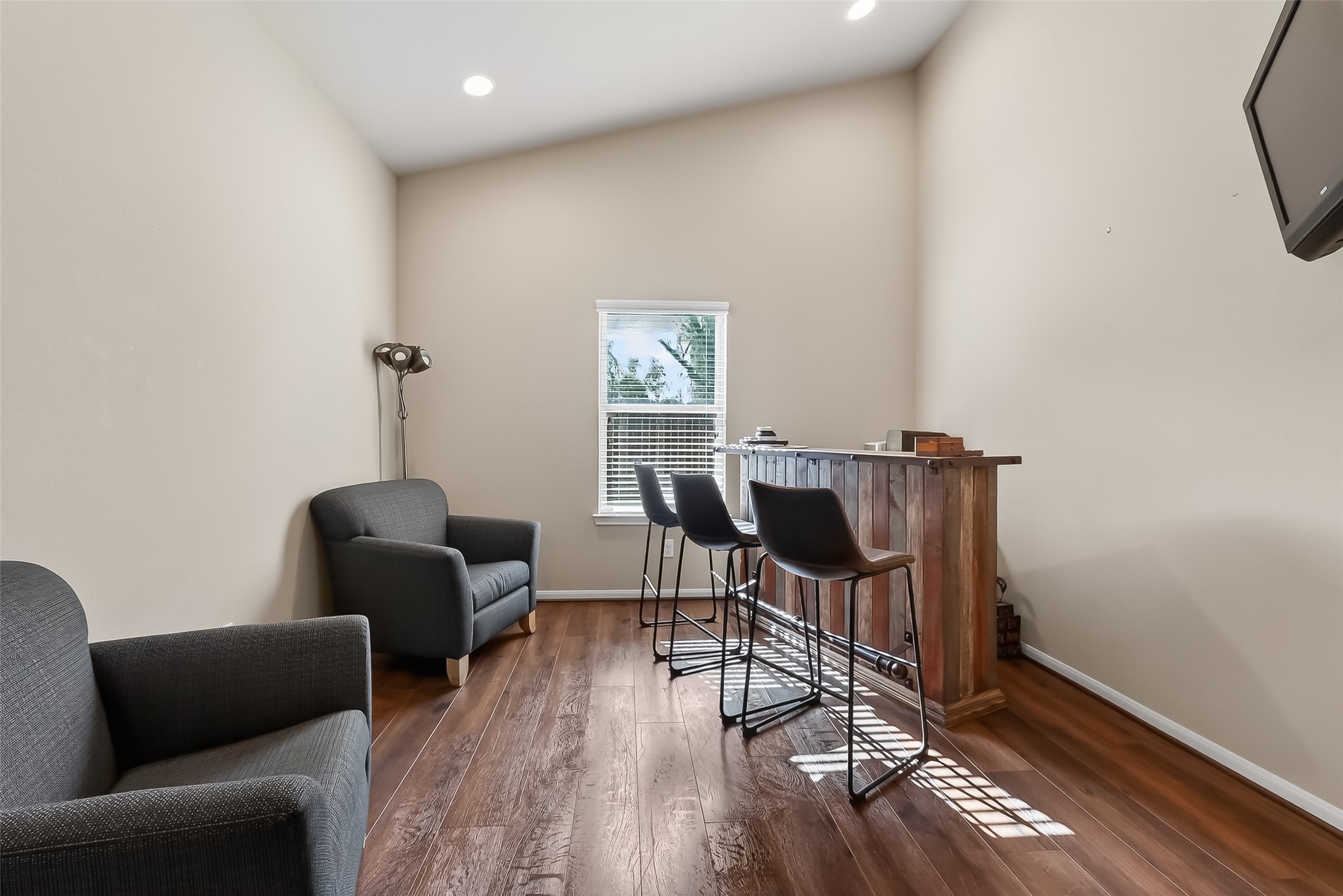 5919 Micah Lane Rosenberg, TX 77471 - Photo 21 of 32 Flexible bonus space with a high ceiling and a window that brings in natural light, creating a bright and comfortable setting