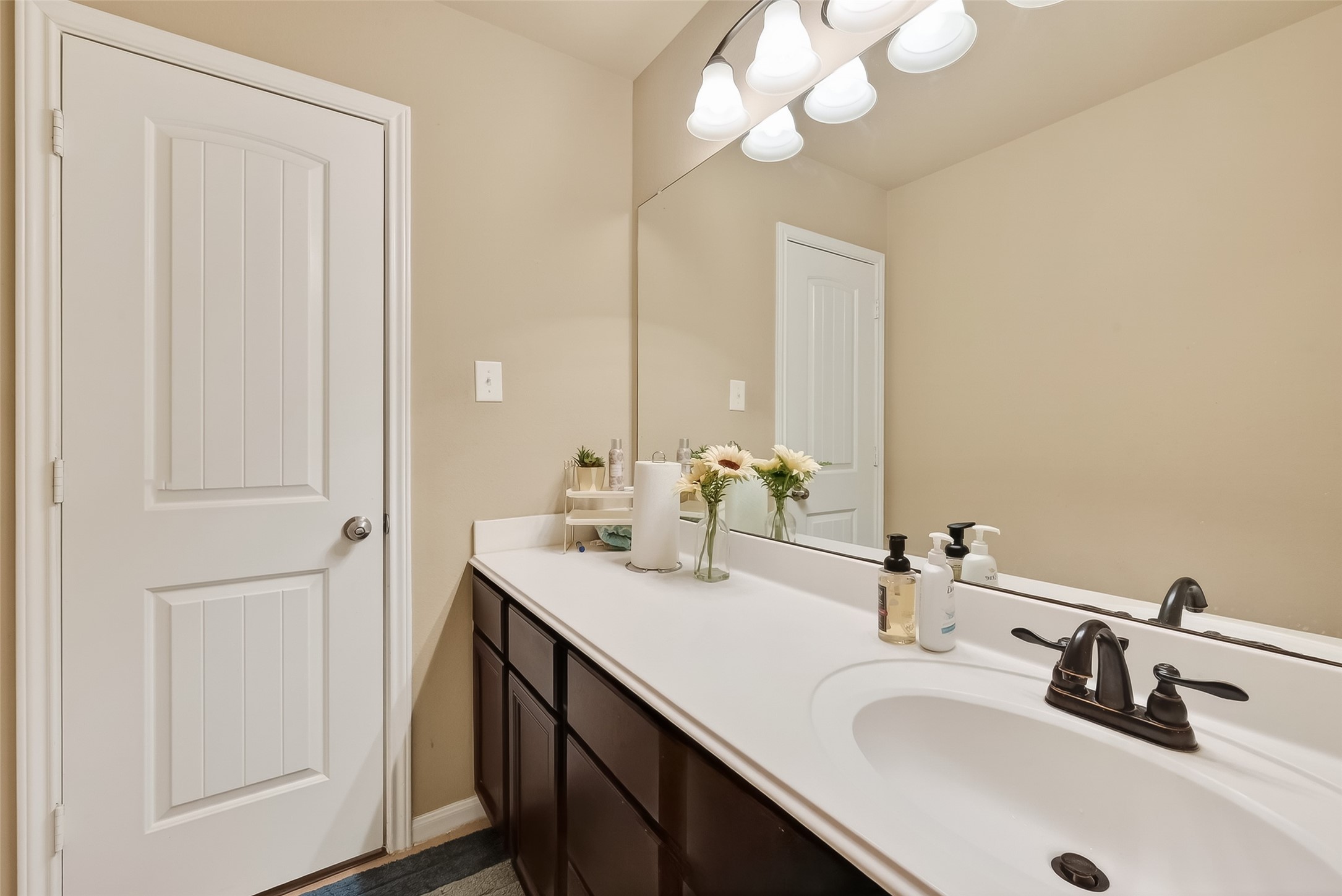 5919 Micah Lane Rosenberg, TX 77471 - Photo 28 of 32 Featuring a well-sized vanity and practical storage, this bathroom makes everyday routines feel easy and organized