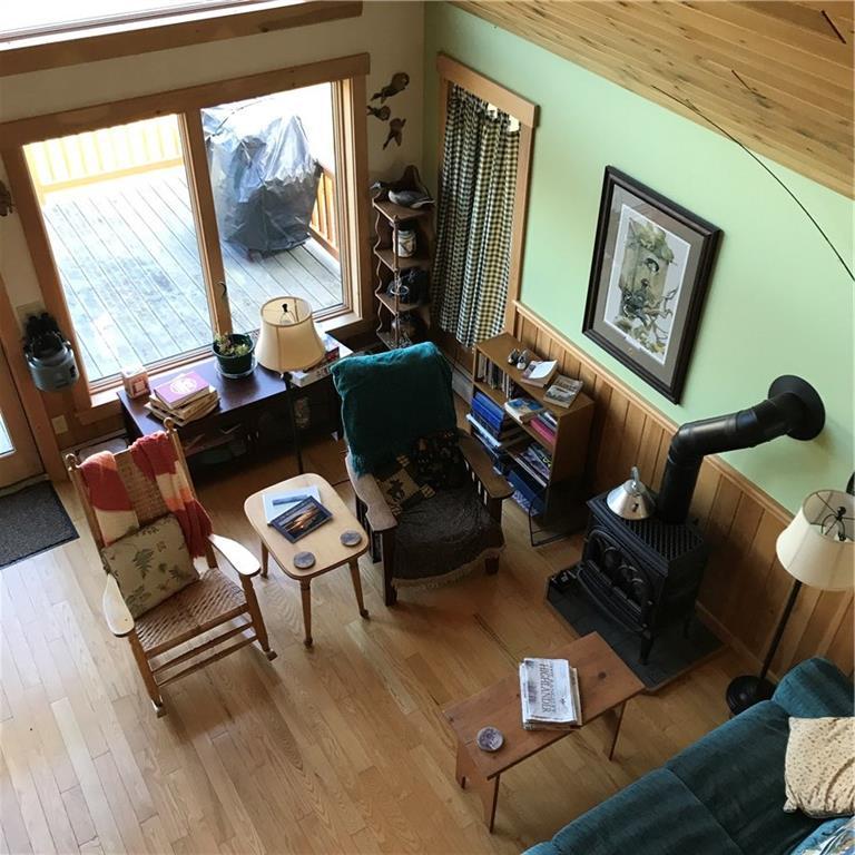 11 Booker Road Rangeley, ME 04970 - Photo 18 of 33 Family room looking down from the loft.