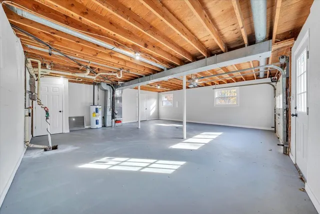 a view of a room with wooden walls