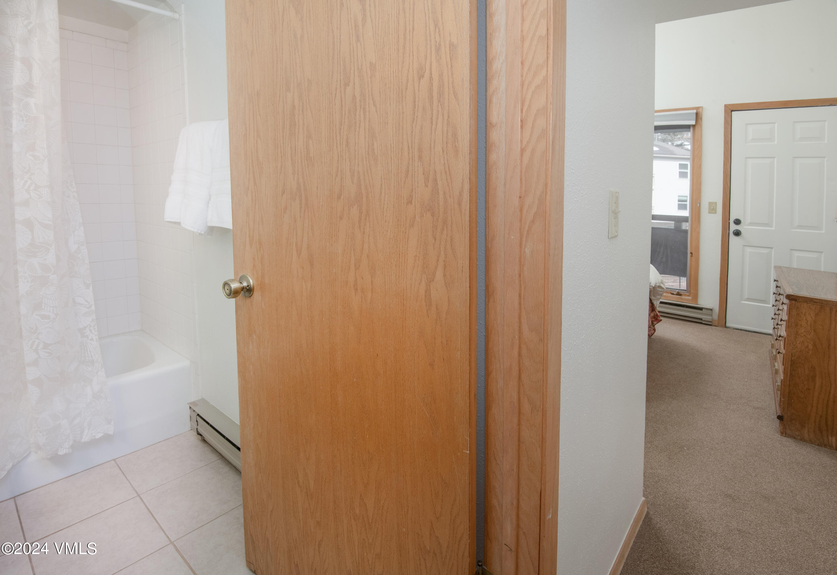 1030 Lions Ridge Loop, Unit 301 Vail, CO 81657 - Photo 19 of 28 a bathroom with a bathtub