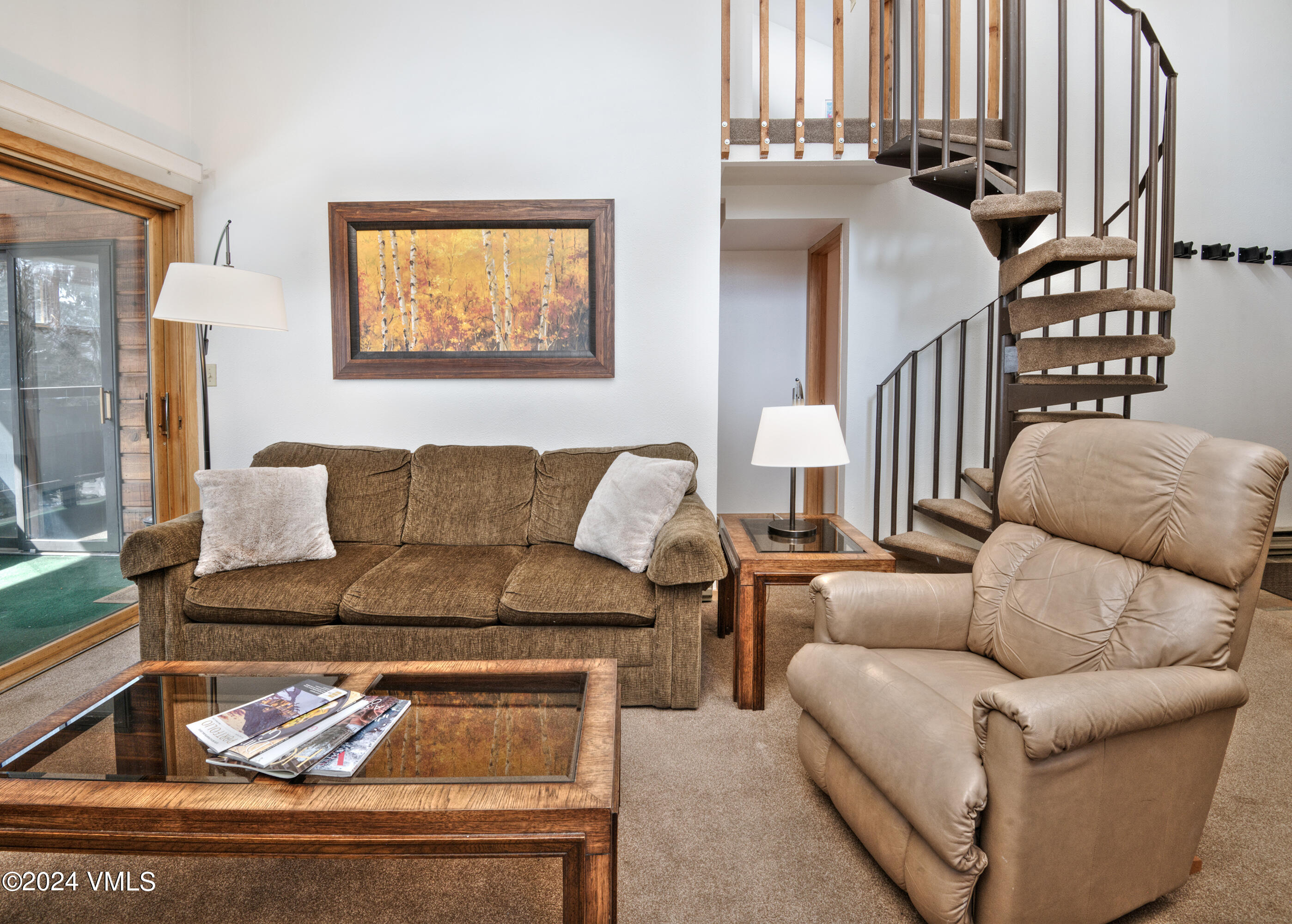 1030 Lions Ridge Loop, Unit 301 Vail, CO 81657 - Photo 8 of 28 a living room with furniture and a painting