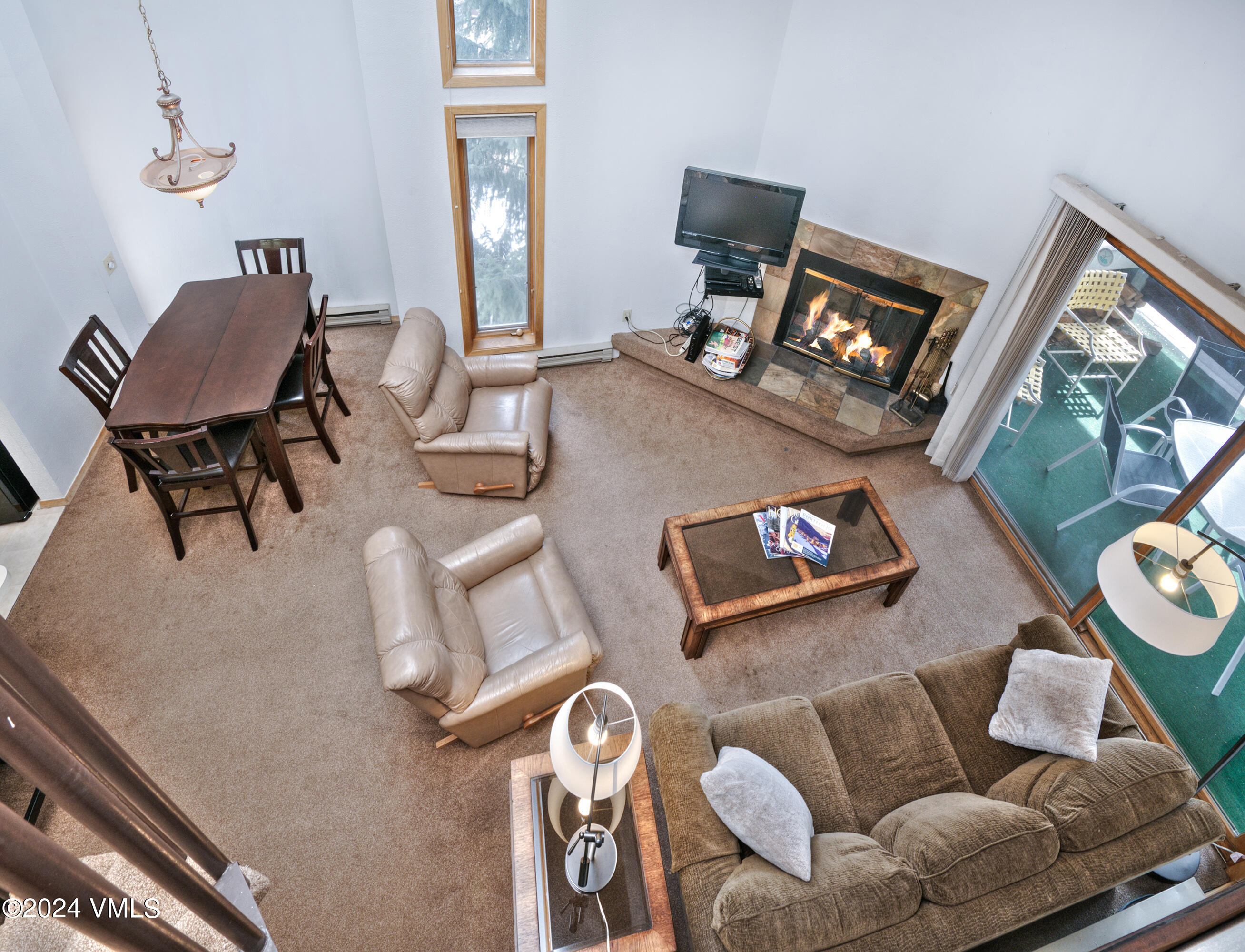 1030 Lions Ridge Loop, Unit 301 Vail, CO 81657 - Photo 9 of 28 a living room with furniture and a flat screen tv