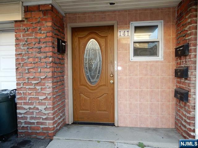 141 Grant Avenue, Unit 3 East Newark, NJ 07029 - Photo 13 of 13 a front view of a house with entrance