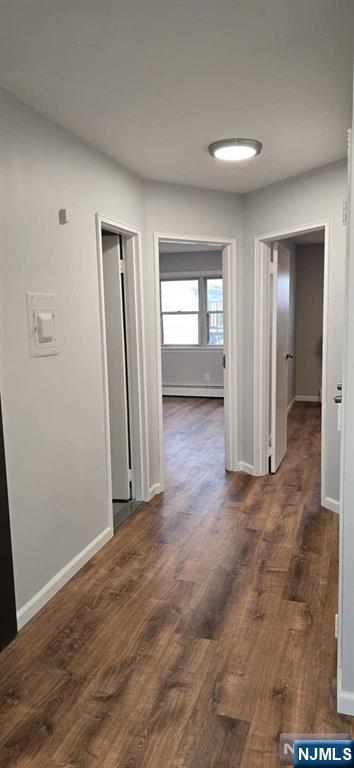 141 Grant Avenue, Unit 3 East Newark, NJ 07029 - Photo 4 of 13 an empty room with windows and closet