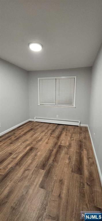 141 Grant Avenue, Unit 3 East Newark, NJ 07029 - Photo 10 of 13 a view of room with wooden floor