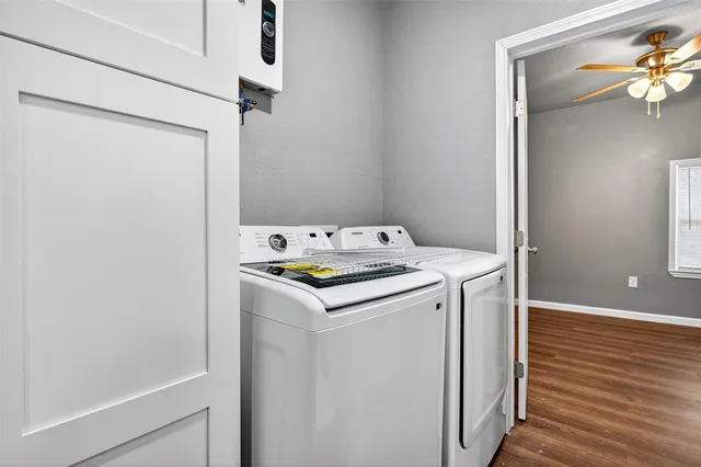 a utility room with washer and dryer