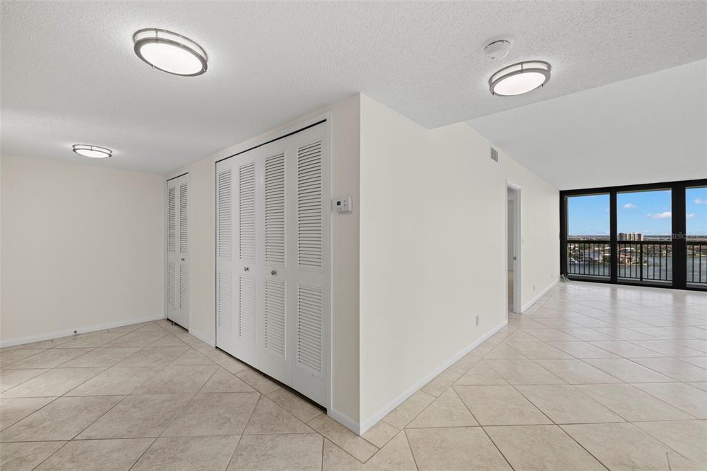 9425 Blind Pass Road, Unit 1008 St. Pete Beach, FL 33706 - Photo 13 of 65 a view of a room with an entryway