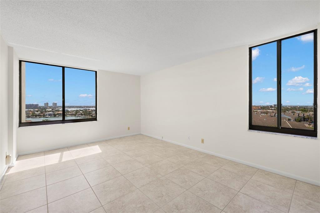 9425 Blind Pass Road, Unit 1008 St. Pete Beach, FL 33706 - Photo 28 of 65 a view of an empty room with a window