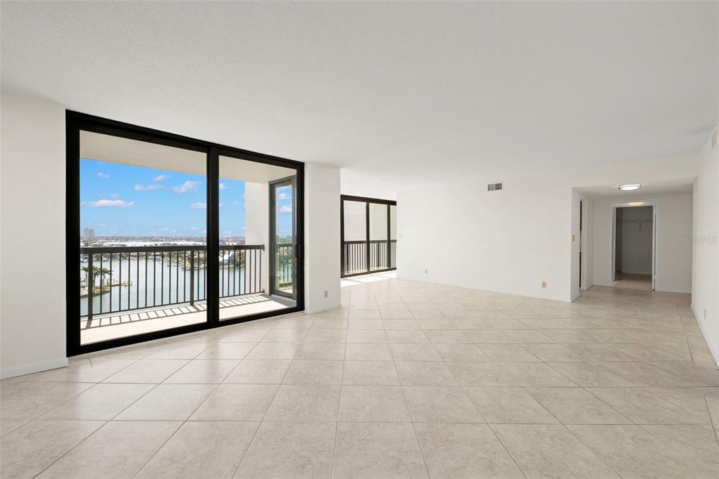 9425 Blind Pass Road, Unit 1008 St. Pete Beach, FL 33706 - Photo 9 of 65 a view of a room with a large window