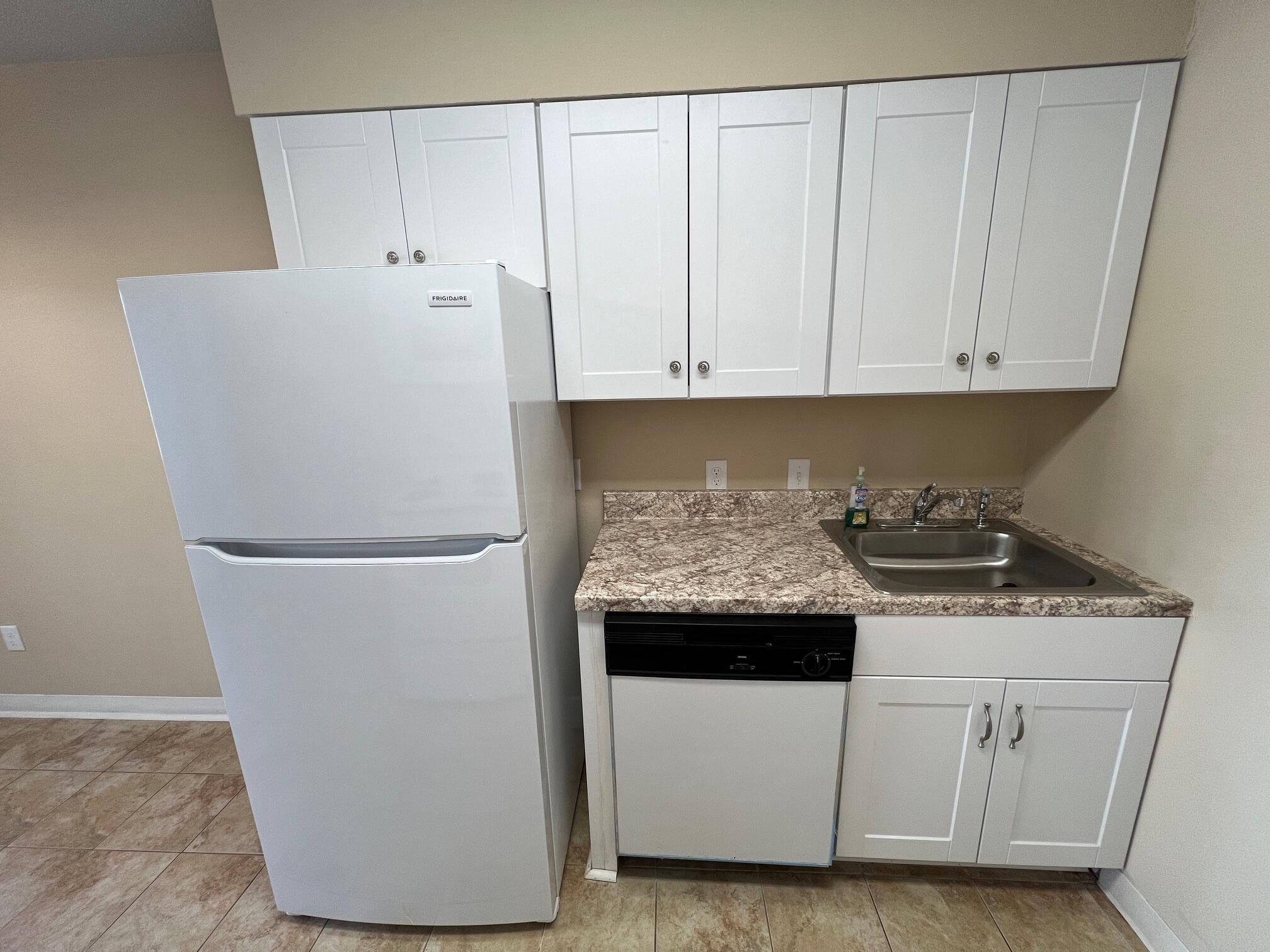 210 Pelham Road, Unit 105B Fort Walton Beach, FL 32547 - Photo 14 of 41 a view of washer and dryer
