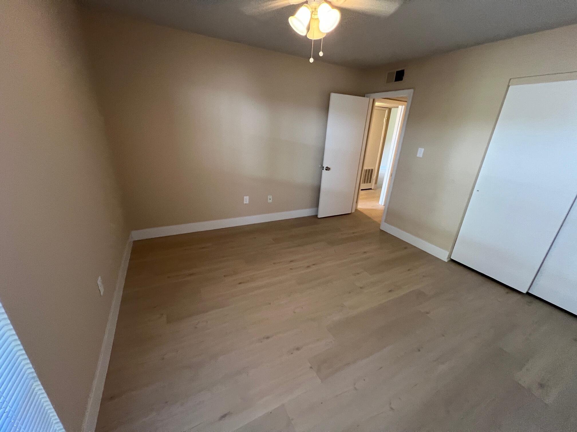210 Pelham Road, Unit 105B Fort Walton Beach, FL 32547 - Photo 20 of 41 an empty room with a bathroom