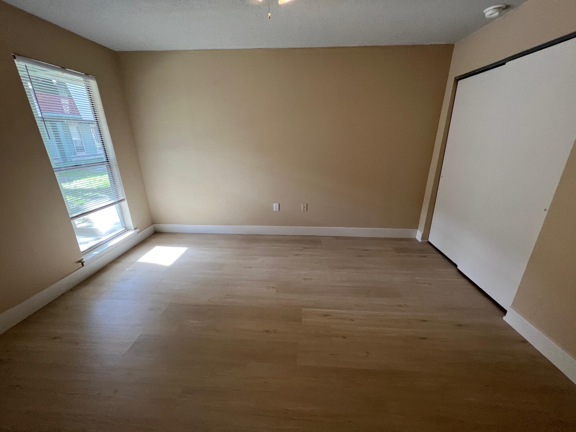 210 Pelham Road, Unit 105B Fort Walton Beach, FL 32547 - Photo 25 of 41 an empty room with windows