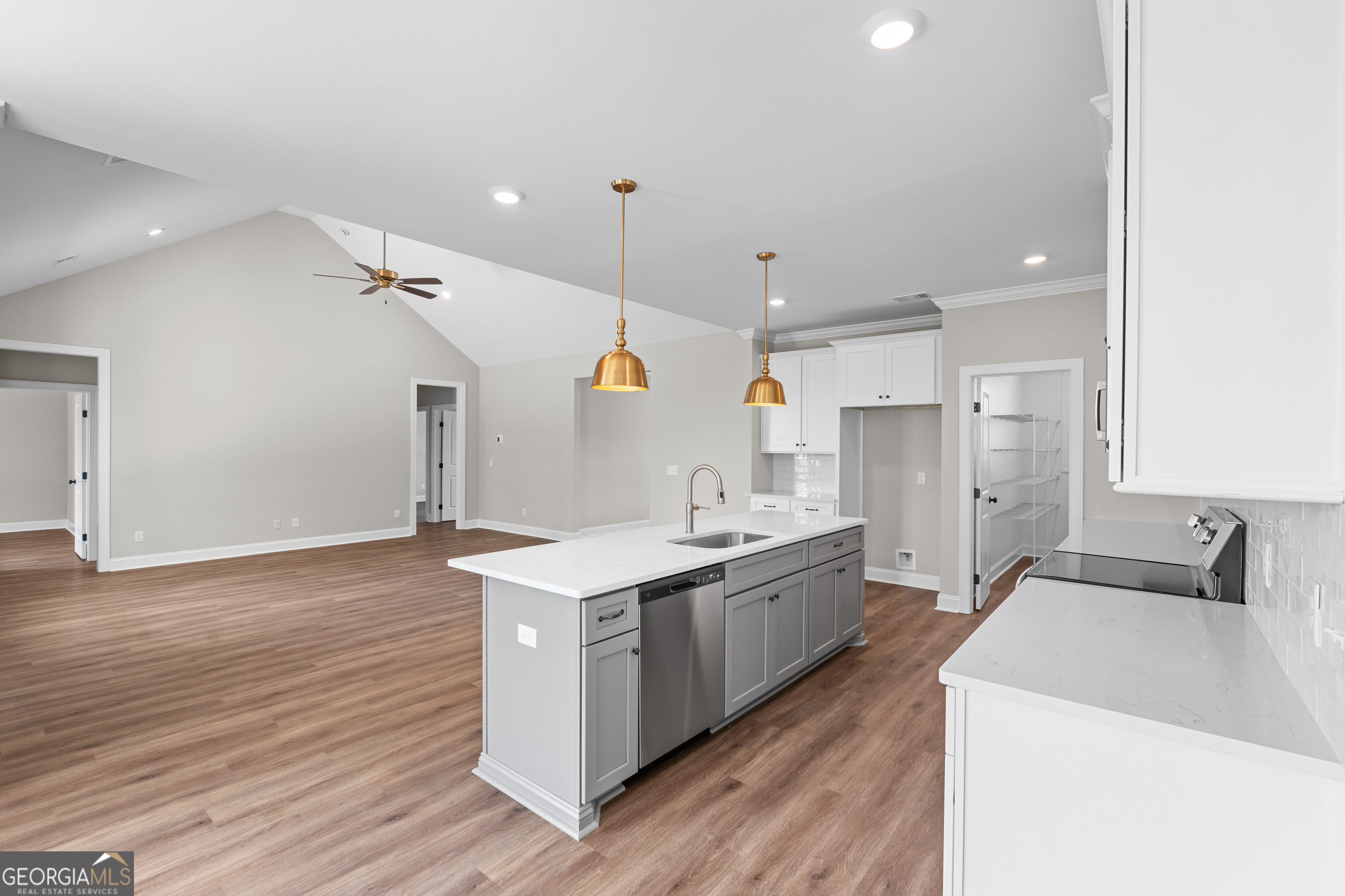 9 Honeysuckle Way Claxton, GA 30417 - Photo 13 of 46 a kitchen with a sink a stove a refrigerator and a microwave