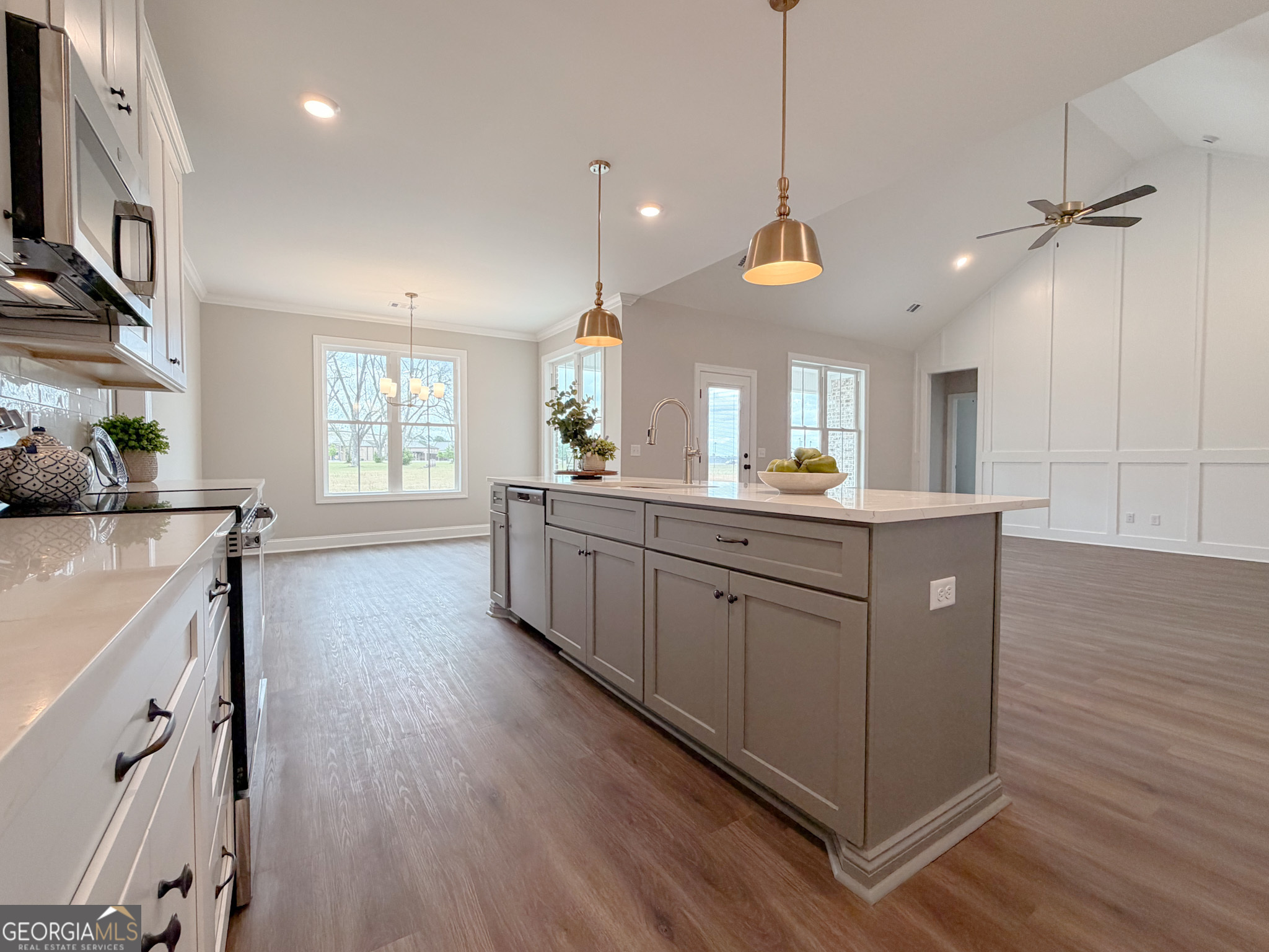 9 Honeysuckle Way Claxton, GA 30417 - Photo 19 of 84 a bathroom with a sink a vanity and a large mirror