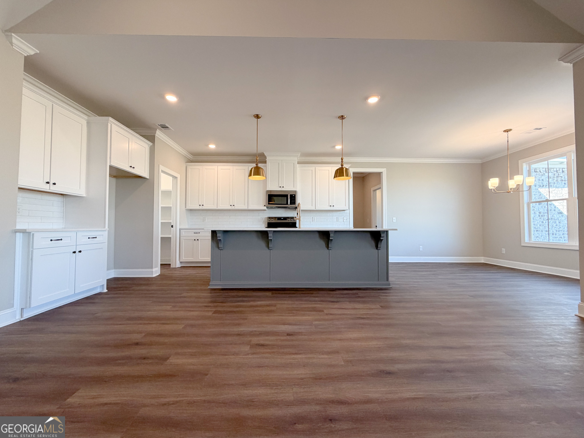 9 Honeysuckle Way Claxton, GA 30417 - Photo 21 of 84 a view of kitchen with wooden floor