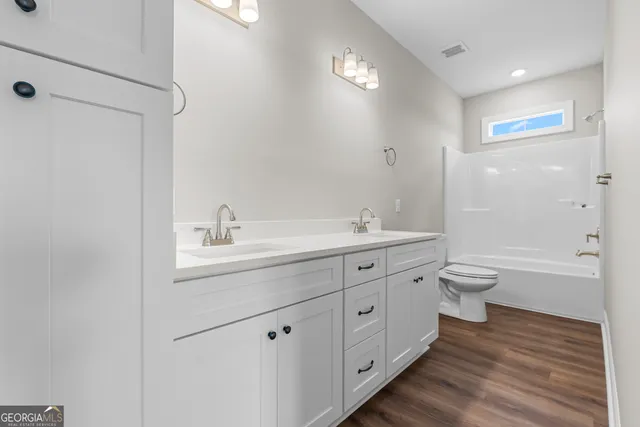 a view of a house with a big yard