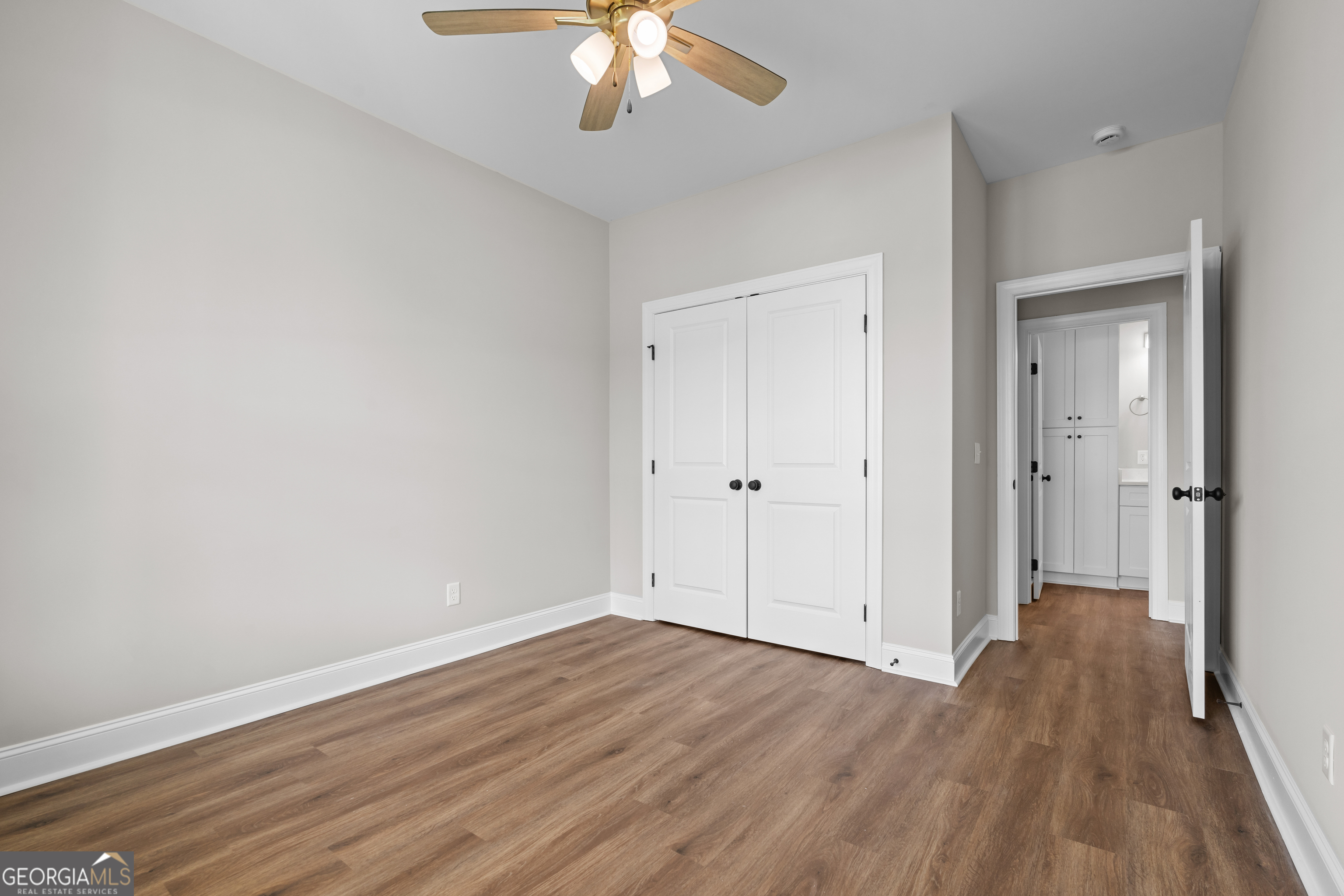 9 Honeysuckle Way Claxton, GA 30417 - Photo 24 of 46 a view of an empty room with wooden floor