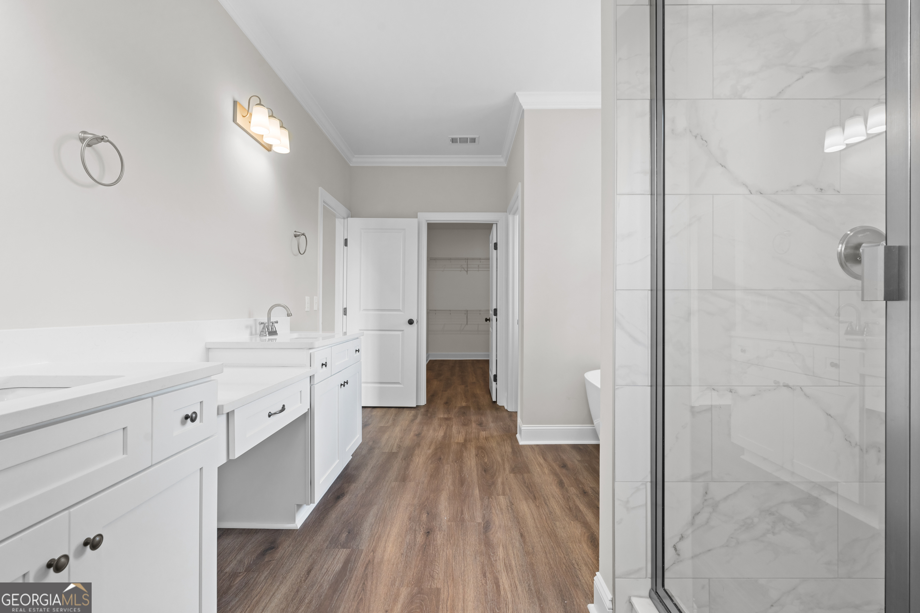 9 Honeysuckle Way Claxton, GA 30417 - Photo 47 of 84 a large bathroom with a granite countertop double vanity sink a mirror and a shower