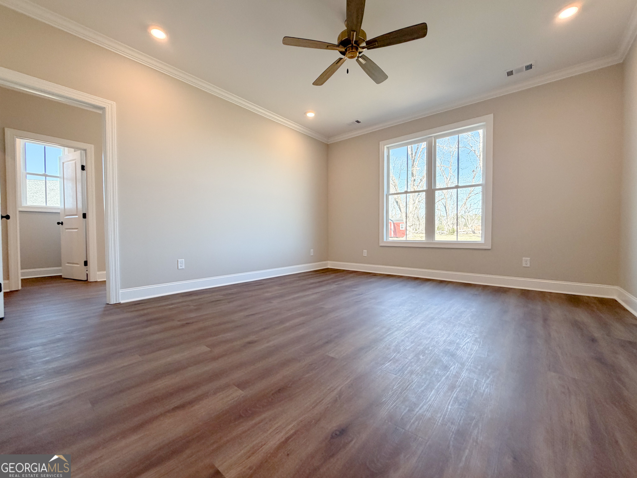 9 Honeysuckle Way Claxton, GA 30417 - Photo 51 of 84 a view of a livingroom with wooden floor and window