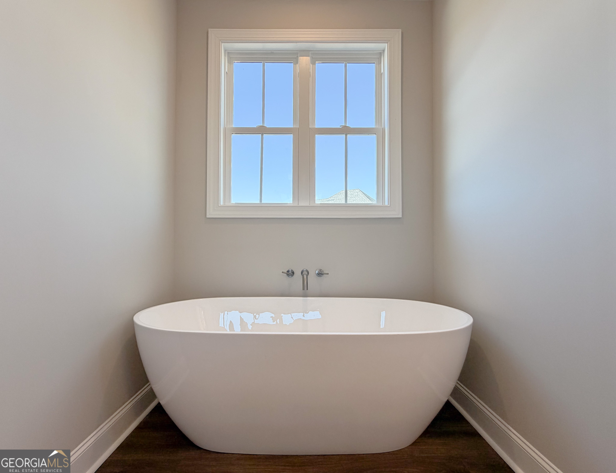 9 Honeysuckle Way Claxton, GA 30417 - Photo 53 of 84 a white bath tub sitting in a bathroom